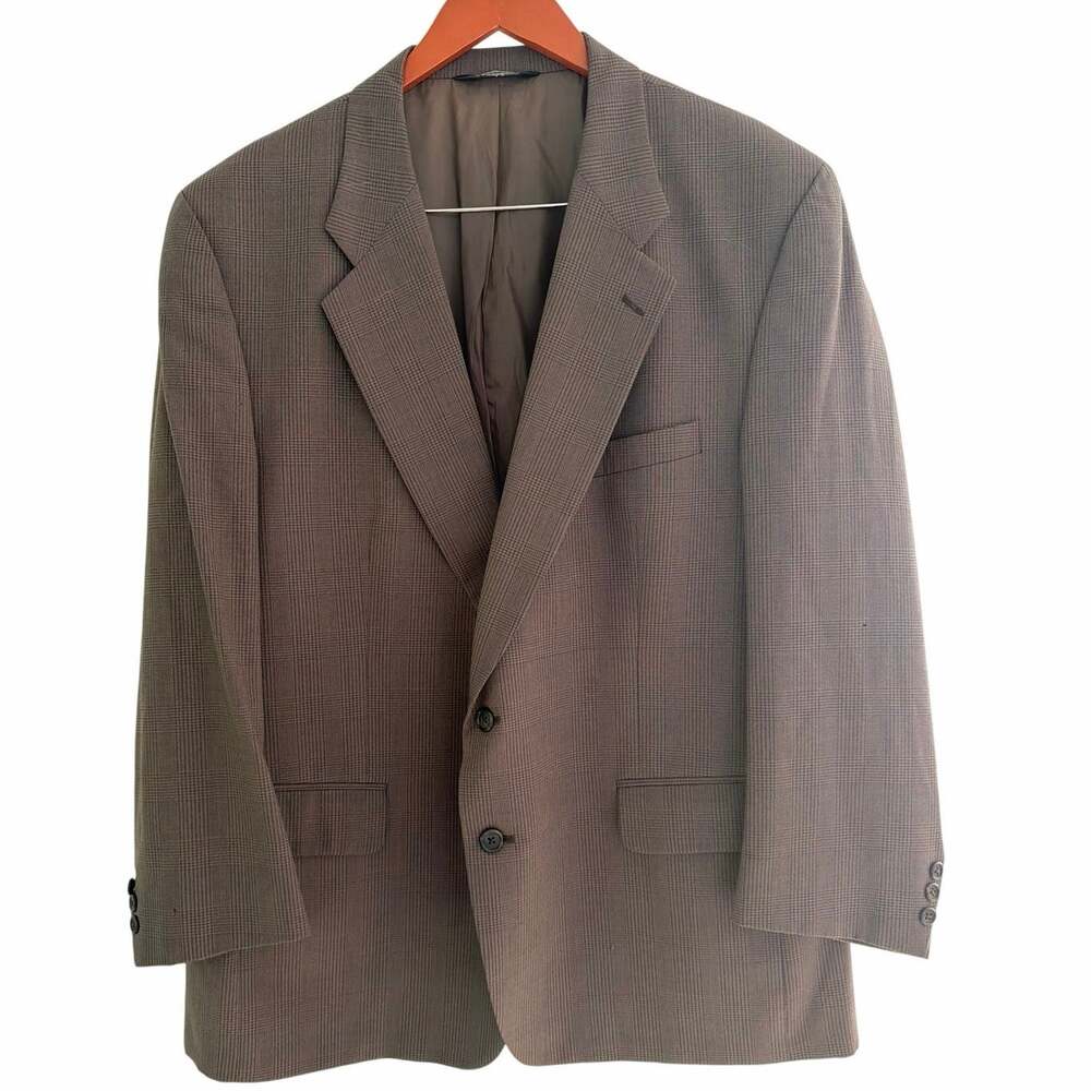 This Burberrys Men's Wool Blazer is an authentic pre-1999 vintage 100% wool